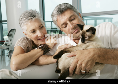 Mature couple with a cat Stock Photo