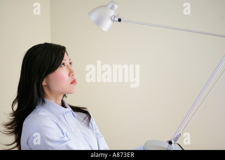 Young woman, side view Stock Photo