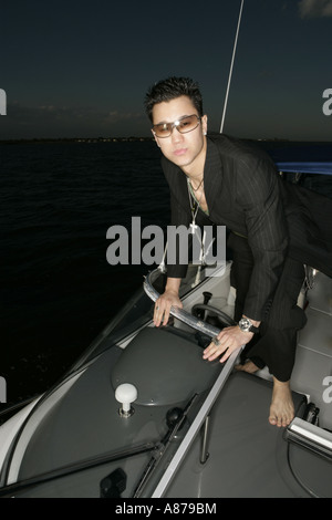 View of a young man on a yacht. Stock Photo