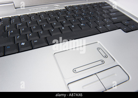 Open laptop notebook computer with focus on keyboard and touchpad input devices Stock Photo