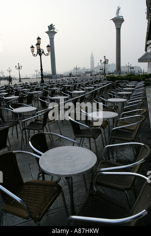 View of tables and chairs arranged in a restaurant Stock Photo - Alamy