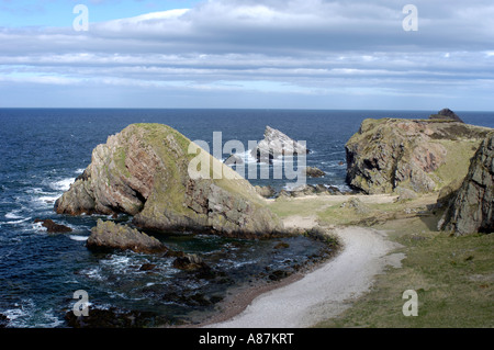 Portknockie rugged scenic coastline of Rocks and beaches overlooks the Moray Firth in Grampian Region Scotland Stock Photo