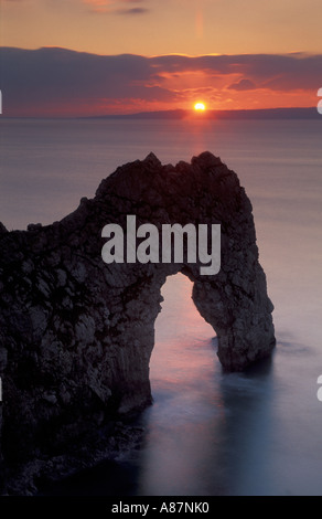 Sunset at Durdle Door nr Lulworth Cove Dorset England UK Stock Photo