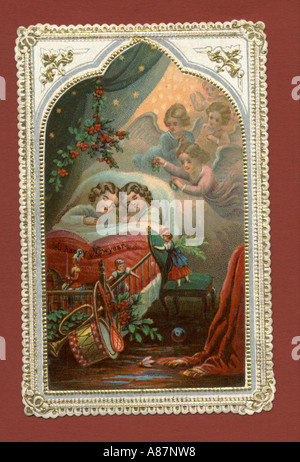 Christmas Greeting card showing children asleep with guardian angels circa 1870 Stock Photo
