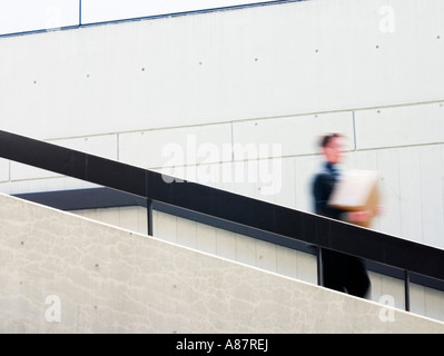 College student descending staircase.