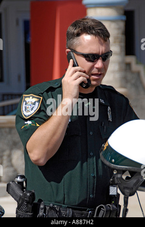 POLICEMAN USES TELEPHONE Stock Photo - Alamy
