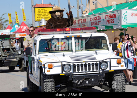 Smokey Bear participates in a parade at the Florida State Fair in Tampa Florida FL Stock Photo