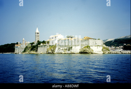 View of Rab from the sea with its four bell towers including the bell tower of the Cathedral of St Mary the Great, Rab, Croatia Stock Photo