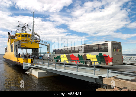A bus driving into a car ferry , going to Hailuoto Island in Finland Stock Photo