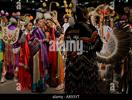 Participants in the annual Gathering of Nations powwow waiting to take part in a contest Stock Photo