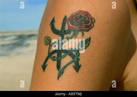 Tattoo on a female arm Stock Photo