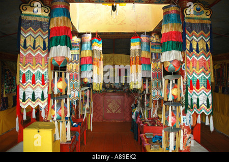 Prayer flags in the prayer hall of the buddhist monastery of Uvgunt Mongolia Stock Photo