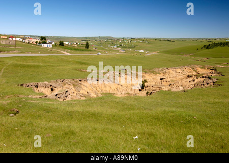 Soil erosion near the town of Mqanduli on the Coffee Bay road in South Africa's Eastern Cape Province. Stock Photo