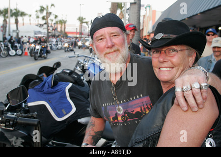 Florida,Volusia County,Daytona Beach,Main Street,Bike Week,motorcycle annual,riders,owners,senior seniors citizen citizens,couple,man men male,woman f Stock Photo