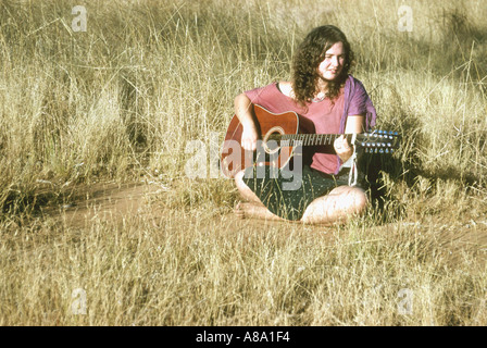 Girl guitar player in the outback Australia Stock Photo