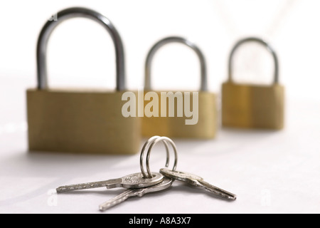 Locks and keys on white background Stock Photo