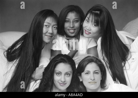 Five beautiful women and four different races Stock Photo