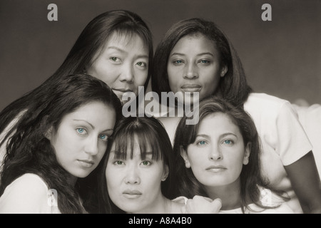 Five beautiful women and four different races Stock Photo