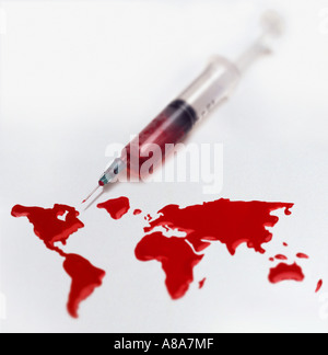 Syringe and a world of blood Stock Photo