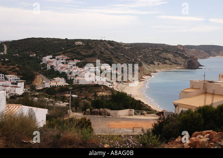 Coast of the Algarve looking towards the east with the fishing village of Salema Portugal Stock Photo