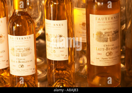 A collection of bottles of different sizes 2000 and 2001 - Chateau Haut Bergeron, Sauternes, Bordeaux Stock Photo