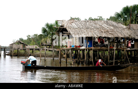 An opensided palafito,  a wooden house on stilts, is home to a Warao Indian family in Venezuela's Orinoco delta Stock Photo