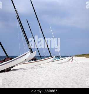 Boats on the beach at Beg Meil in southern Brittany France Stock Photo