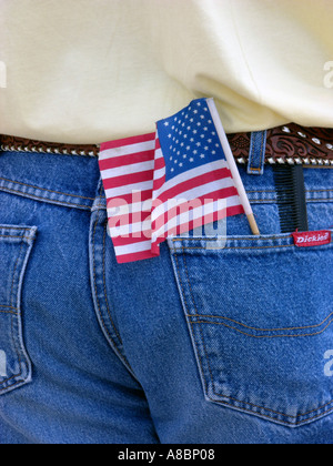 American flag in the back pocket of a man wearing blue jeans Stock Photo