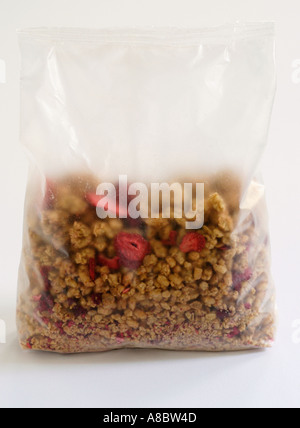Breakfast cereal in translucent packaging on white background Stock Photo