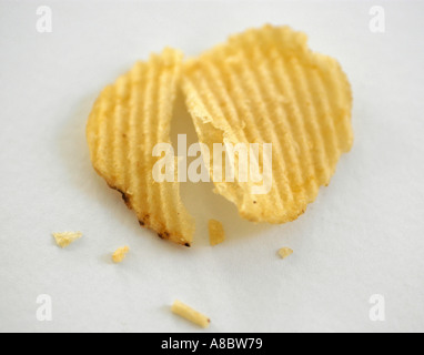 Simple pic of crinkled potato crisps on white background suitable for making cutout for packaging Stock Photo
