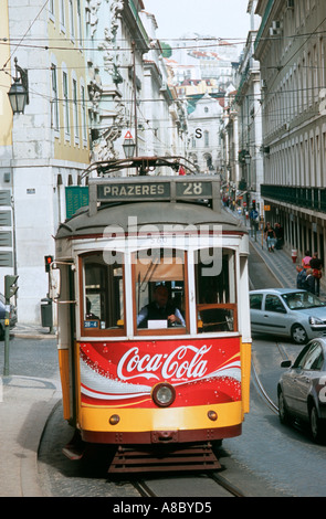 Historical tram No 28 passing through the Rua do Crucifixo, Lisbon Portugal Europe Stock Photo