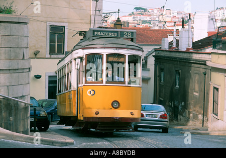 Historical tram No 28 passing through historic Lisbon, Portugal Europe Stock Photo