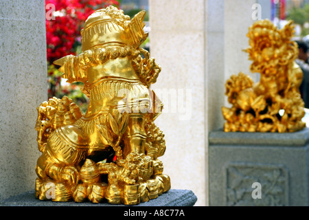 chinese golden lion guardian angel tutelary god saint guardian angel gold golden lion door china chinese house exorcise evil Stock Photo