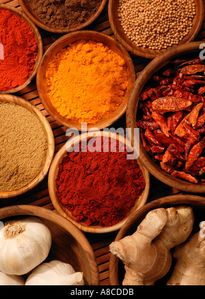 ASSORTED SELECTION OF SPICES IN WOODEN BOWLS Stock Photo