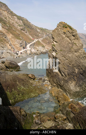 UK Lundy Island arriving visitors on new road from landing beach to the village at high tide Stock Photo