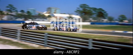 Race cars competing in the 53rd Annual 12 Hours Of Sebring sports car race at Sebring International Raceway Sebring Florida Stock Photo