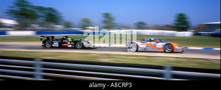 Race cars competing in the 53rd Annual 12 Hours Of Sebring sports car race at Sebring International Raceway Sebring Florida Stock Photo