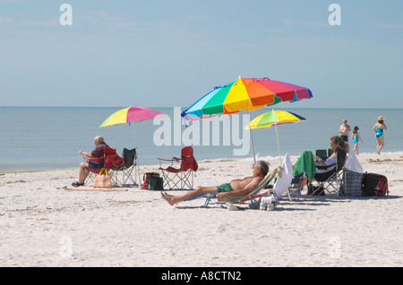 UMBELLAS ON THE BEACH AT GULFSIDE CITY PARK ON THE GULF OF MEXICO ON SANIBEL ISLAND IN SOUTHWEST FLORIDA Stock Photo