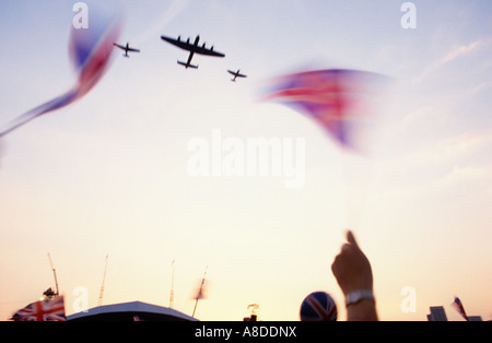 Battle of Britain Memorial aircraft fly in formation over 50th anniversary of VE Day celebrations in London England Stock Photo