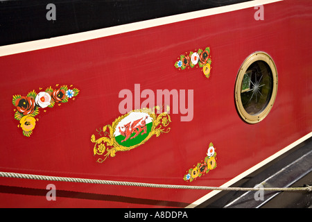 Painted side of canal boat with Welsh dragon Monmouthshire and Brecon Canal Wales UK Stock Photo