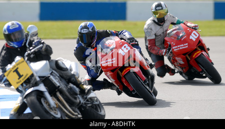 RIDERS TAKING PART IN A MOTORCYCLE TRACK DAY AT DONINGTON PARK RACE CIRCUIT IN LEICESTERSHIRE.UK Stock Photo