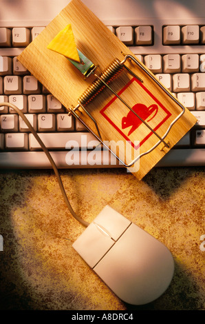 Mouse trap on computer keyboard Stock Photo