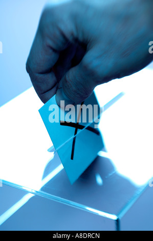 Mans hand and voting cross Stock Photo