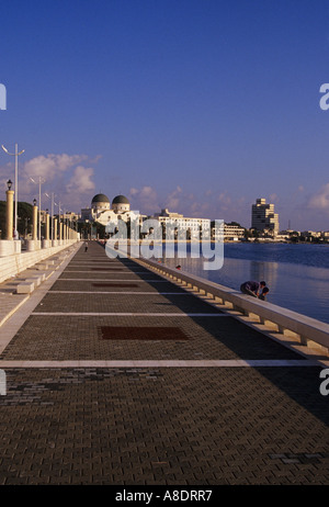 waterfront and mosque former italian cathedral in the background Benghazi Libya Stock Photo