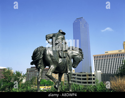 Cowboy statue and skyscraper, Pioneer Plaza, Dallas, Texas, USA Stock Photo
