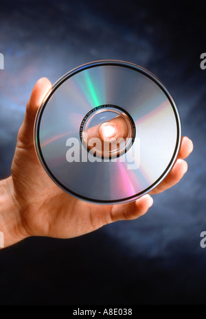 Male hand holding cd disk Stock Photo