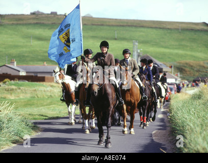 dh Riding of the Marches KIRKWALL ORKNEY Flag bearer riding Kirkwall boundaries at Scapa beach road Stock Photo