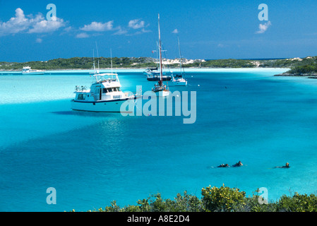Boats moored in channel at Warderick Wells Cay HQ Exumas Land and Sea Park Bahamas Stock Photo