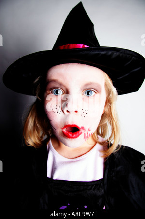four year old girl dressed as witch Stock Photo