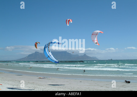 Parasailing on Table Bay at Bloubergstrand a few miles from Cape Town In background Table Mountain Cape Town Stock Photo